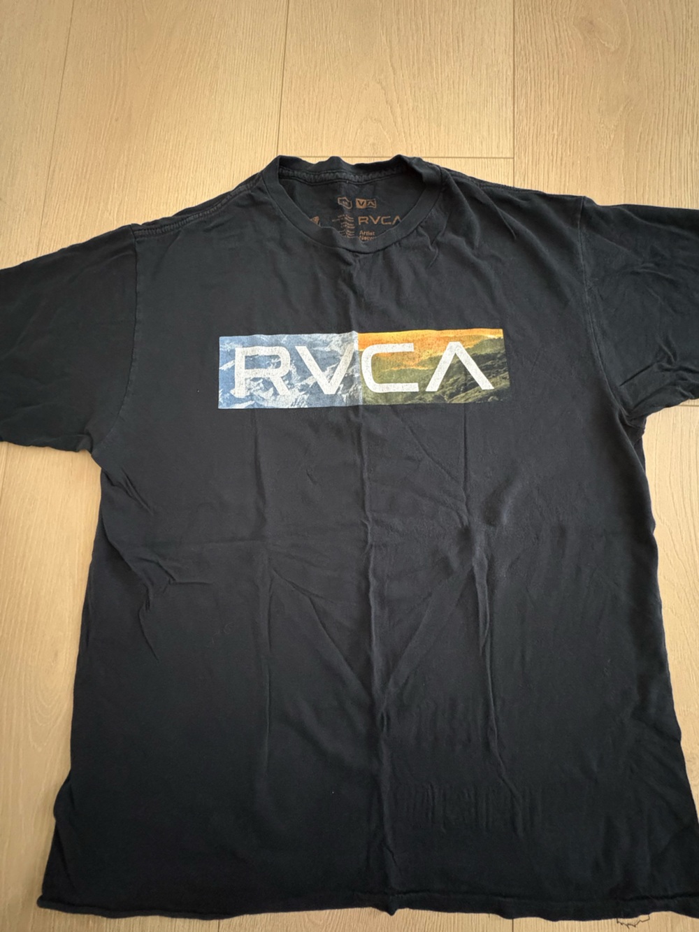 RVCA Black Short Sleeve Tee with Blue, Green and Orange Logo